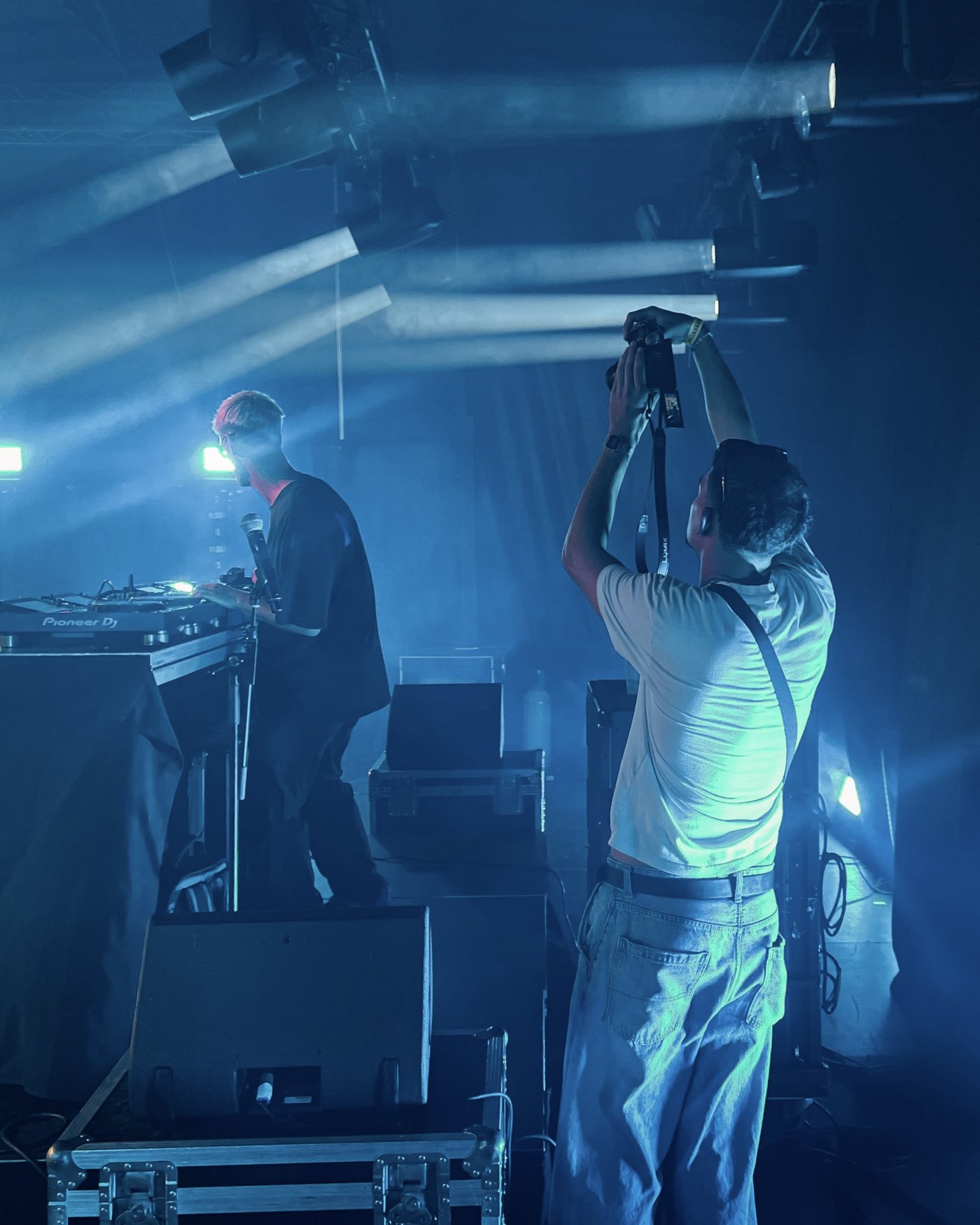 ByBourcier filming behind the camera at a live event